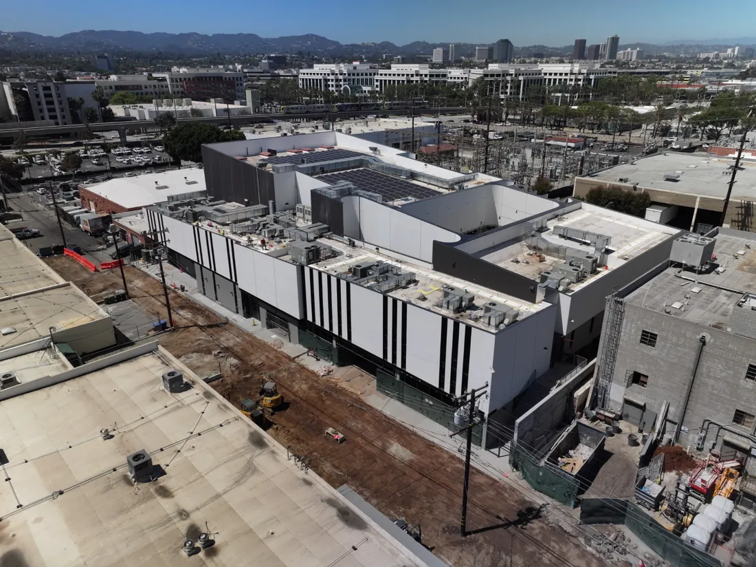 Elevated oblique view of building and surrounding neighborhood