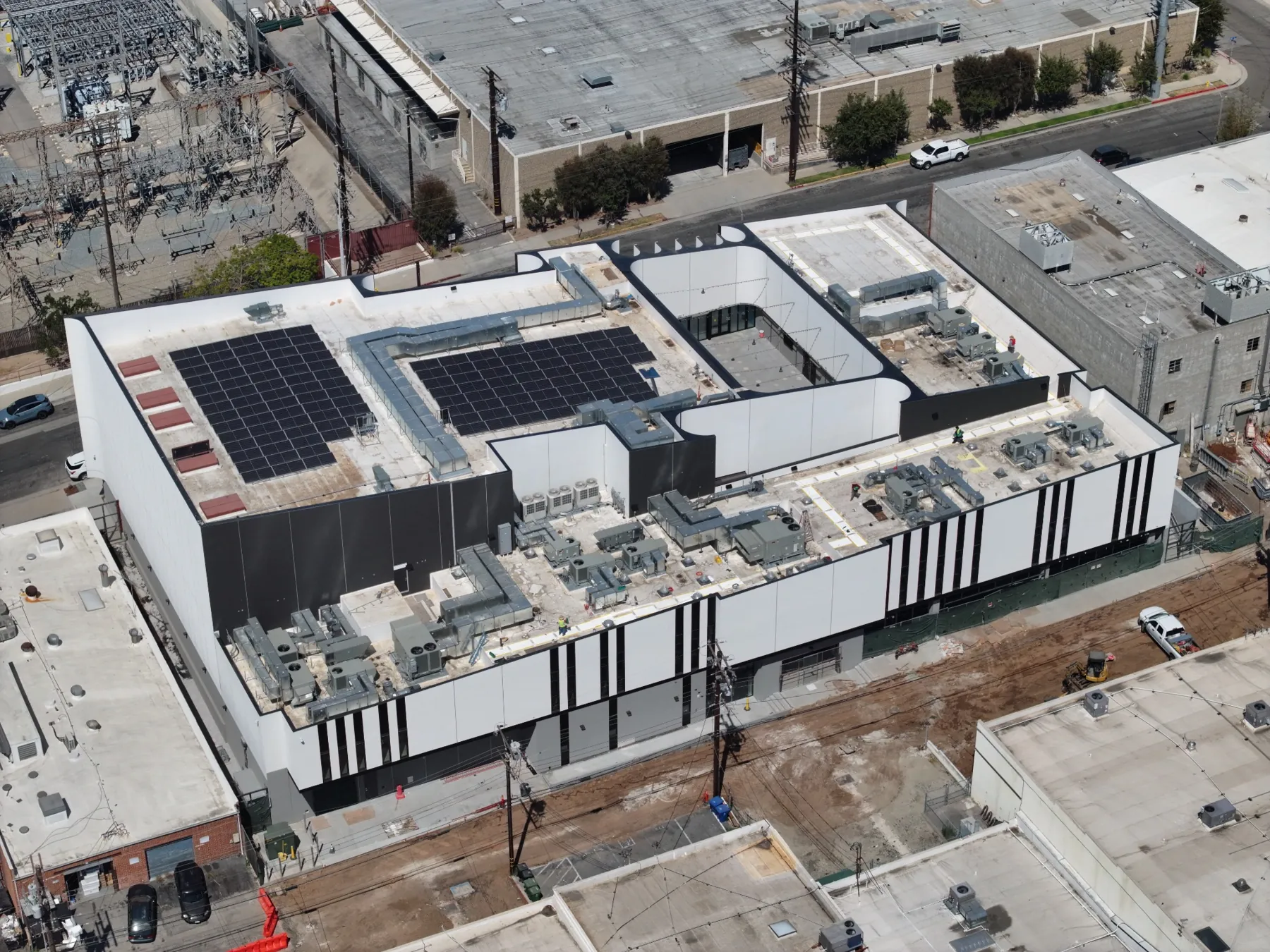 Oblique aerial photograph of a performing arts building during construction